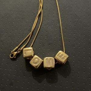 Gold tone LOVE necklace